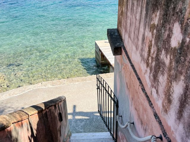 Sale of a traditional stone house on the island of Koločep, first row by the sea, Dubrovnik area